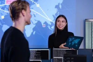 smiling-cyber-security-team-working-in-a-cyber-sec