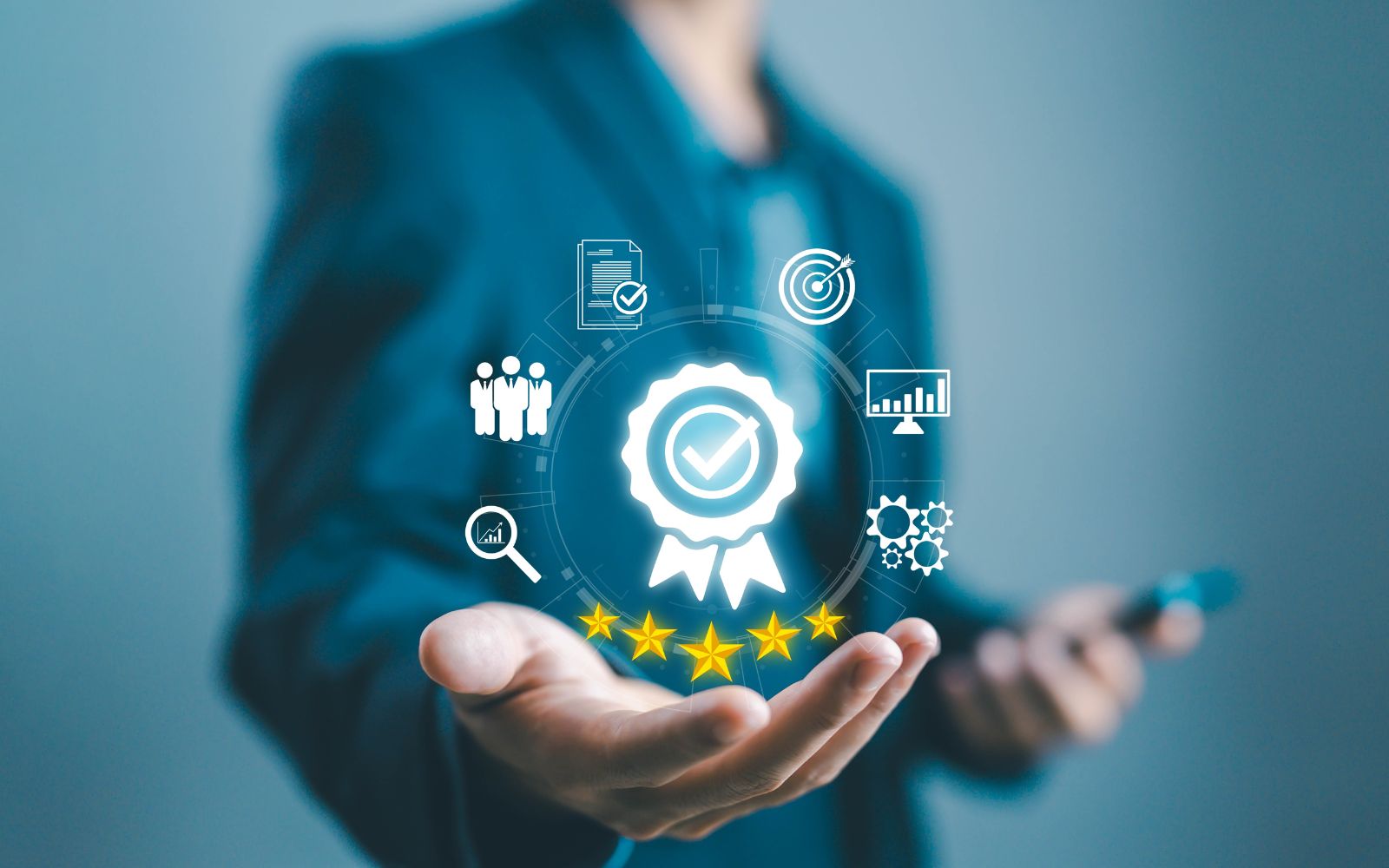 A person in a suit holding an open hand with a glowing badge and five stars, surrounded by icons for quality, teamwork, and analytics, symbolizing excellence.